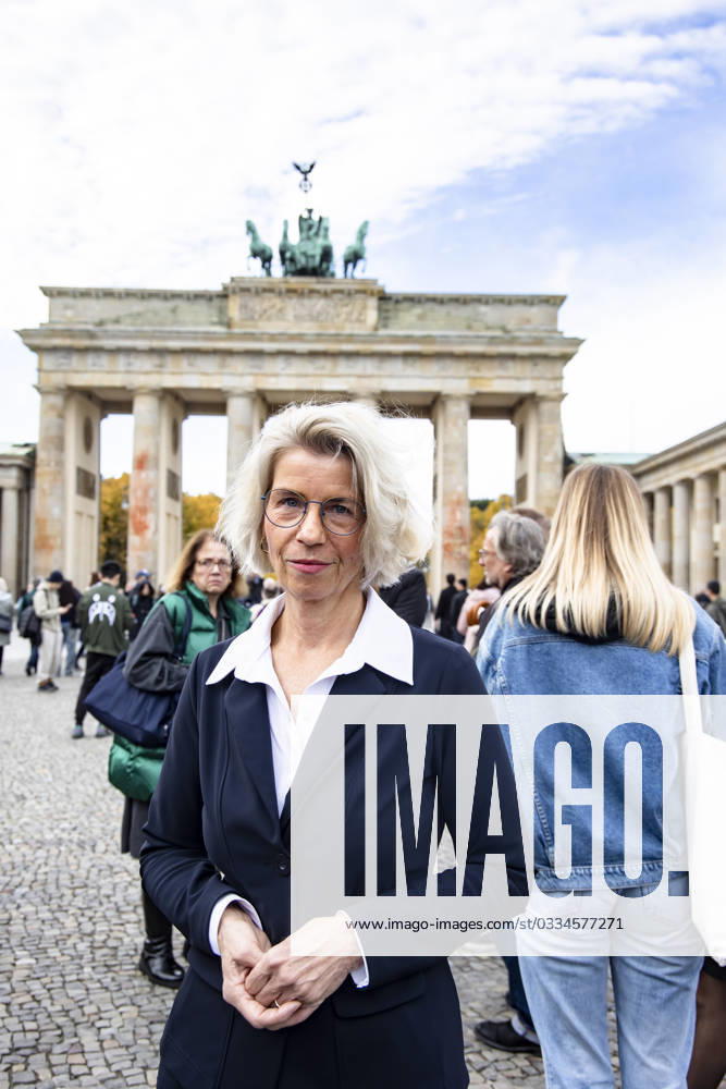 BIM Managing Director Birgit Möhring in front of the Brandenburg Gate in Berlin on October 30, 2023 Cleaning Brandenburg Gate