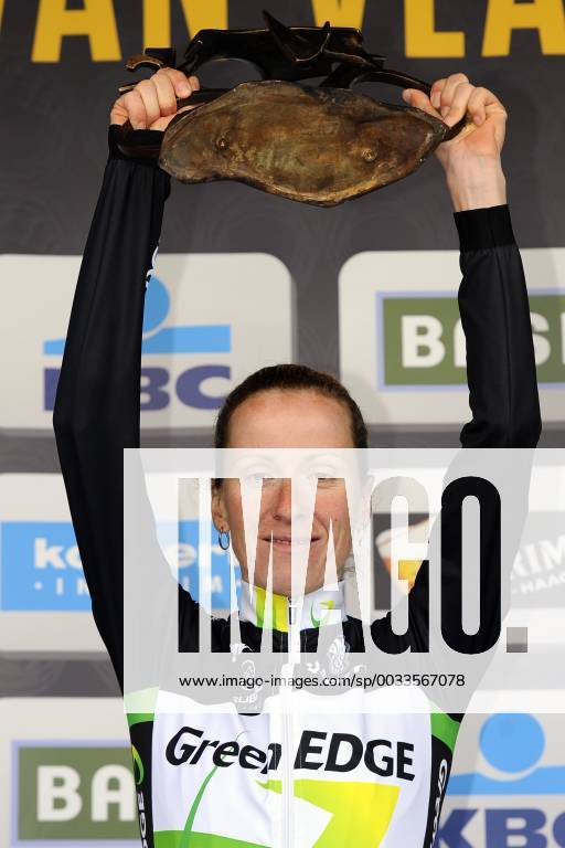 - OUDENAARDE, BELGIUM: German Judith Arndt of team GreenEdge celebrates her victory on the podium after winning the 9th edition of the Ronde van Vlaanderen - Tour des Flandres - Tour of Flanders for women, a one day cycling race, 127 km with start and finish in Oudenaarde, Sunday 01 April 2012. DIRKxWAEM x34261343x