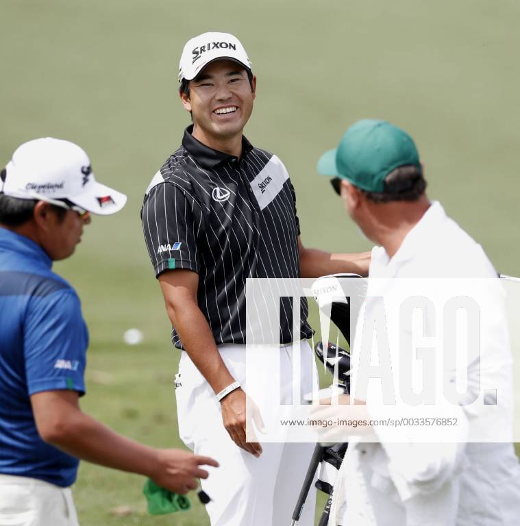 Golf: Matsuyama at Masters Tournament Hideki Matsuyama of Japan (C) smiles at a practice field for the U.S. Masters Tournament in Augusta, Georgia, on April 2, 2018.
