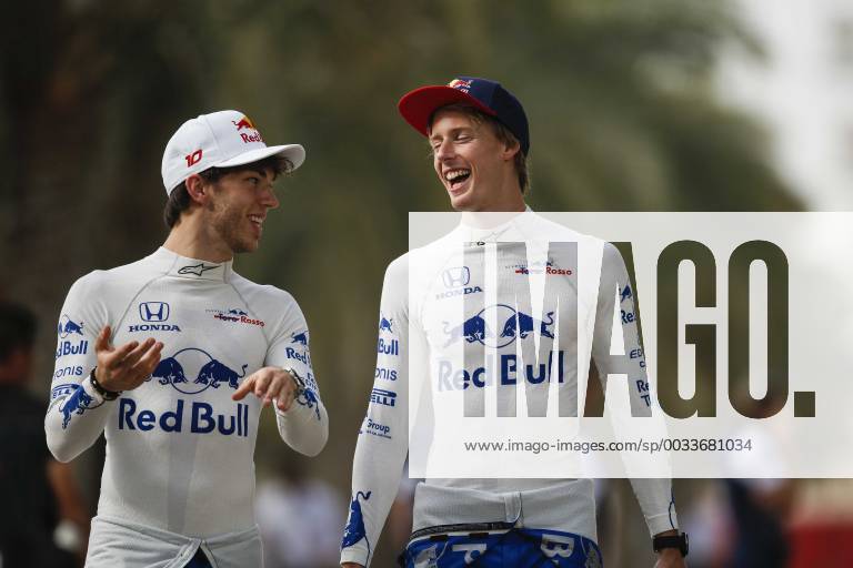 Pierre Gasly of Scuderia Toro Rosso Honda and Brendon Hartley of Scuderia Toro Rosso Honda are seen during preparations of the Bahrain Formula One Grand Prix at the Bahrain International Circuit in Sakhir, Bahrain on 5 April 2018.