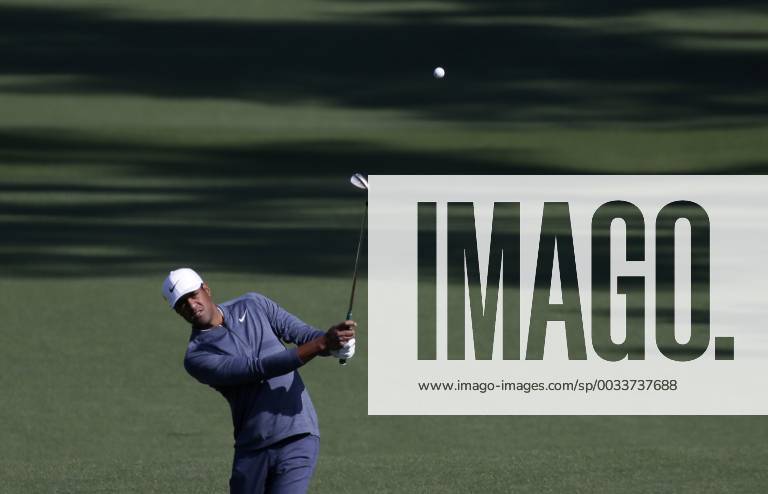 Tony Finau hits his approach shot to the 2nd hole in the 2nd round of the 2018 Masters Tournament at the Augusta National Golf Club in Augusta, Georgia, on April 6, 2018. AUG20180406113 JOHNxANGELILLO