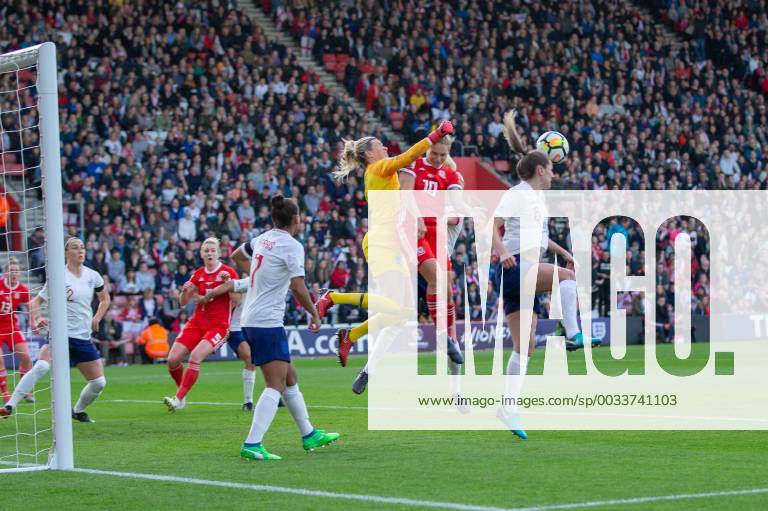 England s Carly Telford punches clear under pressure from Jessica Fishlock(10) of Wales during the 2019 World Cup Qualification match between England Women and Wales Women at the St Mary s Stadium, Southampton, England on 6 April 2018.