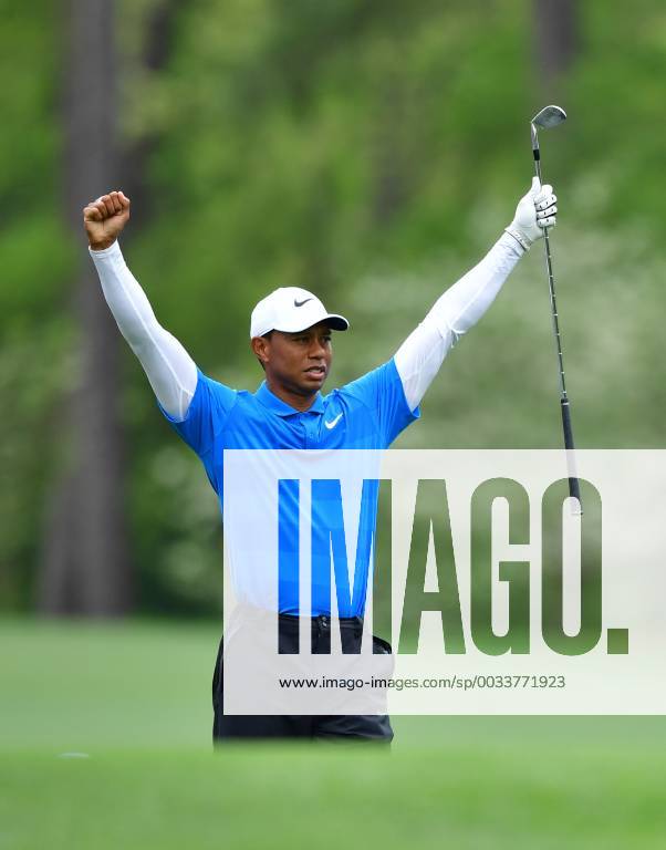Tiger Woods reacts after hitting off the 11th tee during the third round of the 2018 Masters Tournament at the Augusta National Golf Club in Augusta, Georgia, on April 7, 2018. AUG20180407310 KEVINxDIETSCH