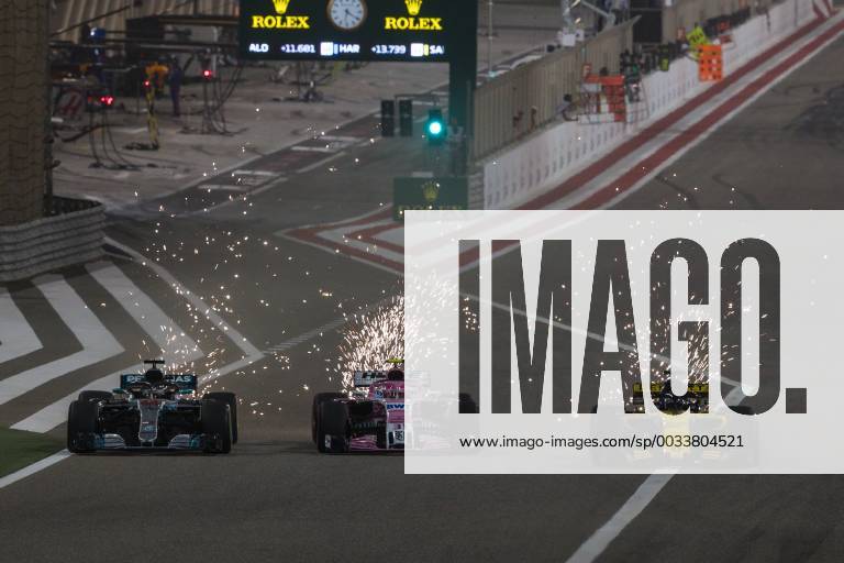 Lewis Hamilton Mercedes AMG Petronas Formula One team in a duel with Esteban Ocon Sahara Force India F1 Team and Nico Huelkenberg Renault Sport F1 Team Grand Prix of Bahrain 2018 Race Motorsport Formula 1 08 04 2018 Sachir