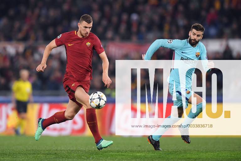 FUSSBALL CHAMPIONS LEAGUE SAISON 2017 2018 VIERTELFINALE RUECKSPIEL AS Rom - FC Barcelona Barca 10.04.2018 Edin Dzeko (re, AS Rom) gegen Gerard Pique (re, Barca)