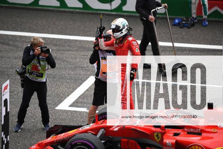 German F1 Sebastian Vettel of Ferrari reacts after winning the pole position in the qualifying session for the 2018 Formula One Chinese Grand Prix at the Shanghai International Circuit in Shanghai, China, 14 April 2018. It s still early, but it looks like Ferrari is back. Ferrari s Sebastian Vettel claimed pole position for Sunday s Chinese Grand Prix, where the German will be going for his third straight victory to open the Formula One season. Vettel and Ferrari teammate Kimi Raikkonen will start on the first row in Shanghai. Mercedes, which has dominated the last four seasons, will start on the second row with Valtteri Bottas ahead of No. 4 Lewis Hamilton - the defending and four-time series champion. The famous Italian team has not won a season title in 11 years with Kimi Raikkonen champion in 2007. But Bottas is already hinting that rival Ferrari is the team to beat. Vettel takes pole in China, and Ferrari looks like it s back