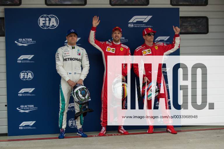 The first three from left Valtteri Bottas Mercedes AMG Petronas Formula One team Sebastian Vettel Scuderia Ferrari and Kimi Raikkoenen Scuderia Ferrari Grand Prix of China 2018 race Motorsport Formula 1 14 04 2018 Shanghai