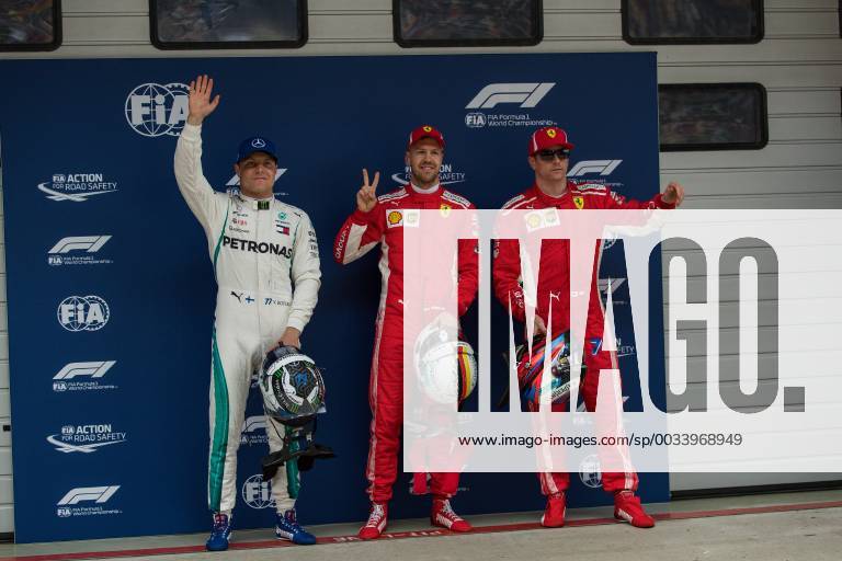The first three from left Valtteri Bottas Mercedes AMG Petronas Formula One team Sebastian Vettel Scuderia Ferrari and Kimi Raikkoenen Scuderia Ferrari Grand Prix of China 2018 race Motorsport Formula 1 14 04 2018 Shanghai