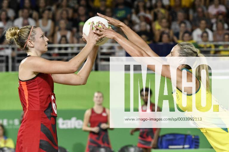 - SPORT 15th April 2018, Coomera Indoor Sports Centre, Gold Coast, Australia; Commonwealth Games day 11; Netball Gold Medal game, Australia versus England ; Jo Harten of England prepares to shoot as Laura Geitz of Australia makes contact ActionPlus12014413