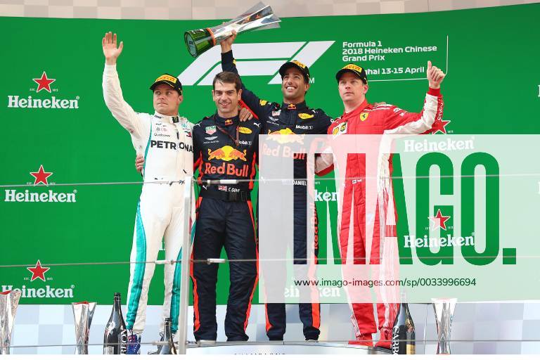 (From left) First runner-up Finnish F1 driver Valtteri Bottas of Mercedes, Australian F1 driver Daniel Ricciardo of Red Bull Racing, winner Australian F1 driver Daniel Ricciardo of Red Bull Racing and second runner-up Finnish F1 driver Kimi Raikkonen of Ferrari pose on the podium during the award presentation ceremony of the 2018 Formula One Chinese Grand Prix at the Shanghai International Circuit in Shanghai, China, 15 April 2018. Daniel Ricciardo charged from sixth to score a stunning first win of the 2018 Formula 1 season as Max Verstappen and Sebastian Vettel collided in a wild Chinese Grand Prix. Bottas and Vettel were locked in their own battle for the win until Ricciardo and Verstappen pitted again for fresh, soft tyres during a safety car period just after the halfway mark as their rivals stayed on mediums. Ricciardo then overtook his team-mate, Lewis Hamilton and Vettel in quick succession before executing a stunning pass on Bottas into the tight Turn 6 right-hander for the victory. Daniel Ricciardo storms to Chinese Grand Prix victory for Red Bull