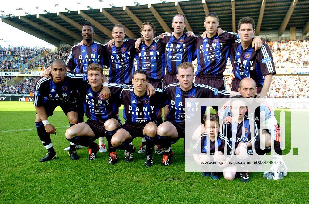 BRU93 - - BRUGGE, BELGIUM : Brugge s players pose with a shirt in honor to goal keeper Dany Verlindenon which is written Dany Forever at the beginning of the first league soccer match Club Brugge vs Lierse, Saturday 15 May 2004, in Brugge. FROM L-R (back row) Andres Mendoza, David Rozehnal, Nastja Ceh, Philip Clement, Timmy Simons, Peter Van Der Heyden, (front row) Victor Simoes De Oliveira, Gert Verheyen, Gaetan Englebert, Olivier De Cock and Dany Verlinden with his sons. Club Brugge defeated Lierse 3-0. YVESxBOUCAU x1846619x