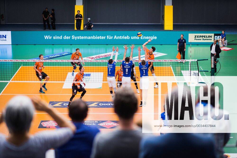 Friedrichshafen Germany 26 04 2018 Adam White BR Volleys 11 against the block from Athanasios Protopsaltis Friedrichshafen 7 Martin Atanasov Friedrichshafen 8 Bartlomiej Boladz Friedrichshafen 1 at Playoff Final Game 1 of the Volleyball Bundesliga between VfB Friedrichshafen and the Berlin Recycling Volleys