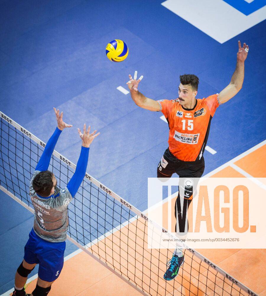 Berlin Germany 29 04 2018 Russell Kyle BR Volleys 15 against the block from David Sossenheimer Friedrichshafen 5 in the Playoff Final Game 2 of the Volleyball Bundesliga between Berlin Recycling Volleys and VfB Friedrichshafen