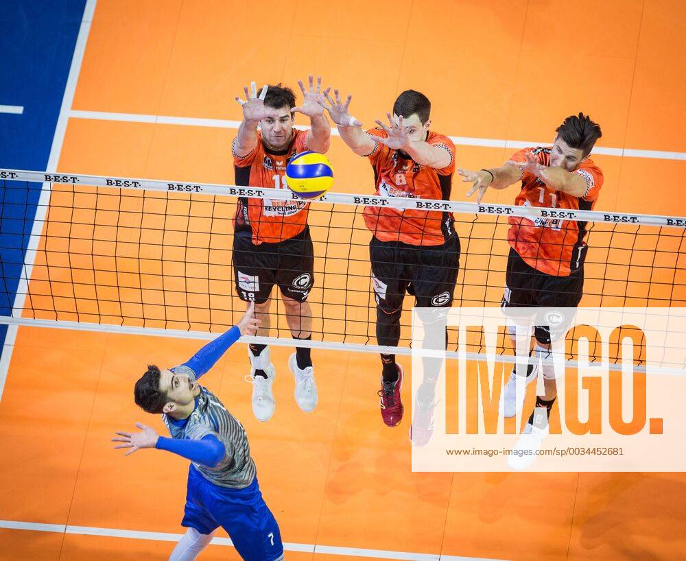 Berlin Germany 29 04 2018 Martin Atanasov Friedrichshafen 8 against the block from Adam White BR Volleys 11 Graham Vigrass BR Volleys 8 Adam White BR Volleys 11 at Playoff Final Game 2 of the Volleyball Bundesliga between Berlin Recycling Volleys and VfB Friedrichshafen