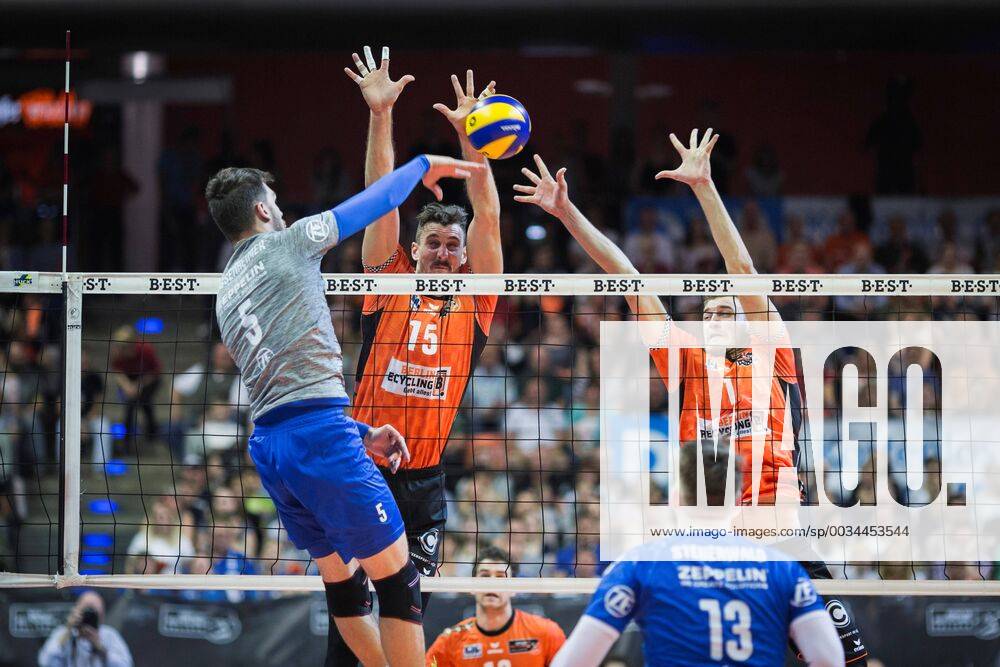 Berlin Germany 29 04 2018 David Sossenheimer Friedrichshafen 5 against the block from Russell Kyle BR Volleys 15 and Aleksandar Okolic BR Volleys 1 at Playoff Final Game 2 of the Volleyball Bundesliga between Berlin Recycling Volleys and VfB Friedrichshafen