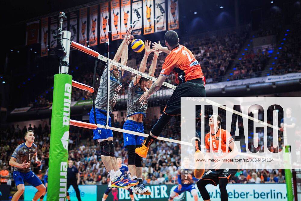 Berlin Germany 29 04 2018 Steven Marshall BR Volleys 2 against the block from Simon Tischer Friedrichshafen 10 and Philipp Collin Friedrichshafen 9 at the Playoff Final Game 2 of the Volleyball Bundesliga between Berlin Recycling Volleys and VfB Friedrichshafen