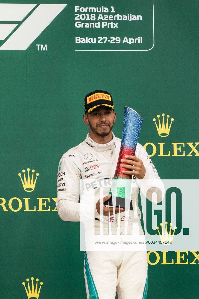 (180429) -- BAKU, April 29, 2018 -- Mercedes Lewis Hamilton of Britain celebrates with his trophy on the podium during the awarding ceremony for Azerbaijan Formula One Grand Prix in Baku, Azerbaijan, April 29, 2018. ) (SP)AZERBAIJAN-BAKU-F1-AZERBAIJAN GRAND PRIX WuxZhuang