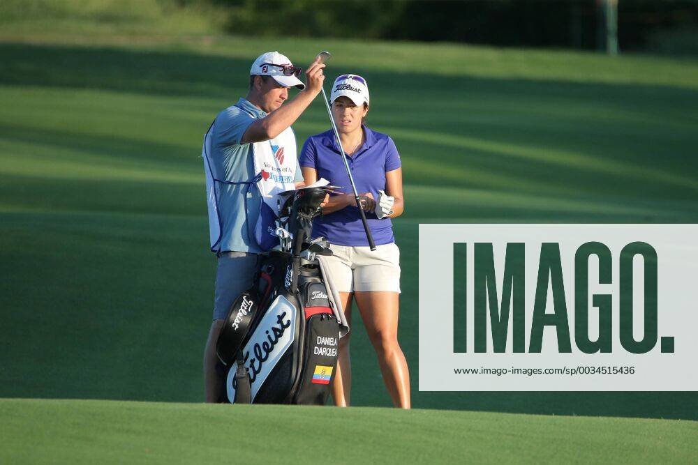 THE COLONY, TX - MAY 04: Daniela Darquea of Ecuador gets a club from her caddy on the 17th fairway during the first round of the Volunteers of America LPGA Golf Damen Texas Classic on May 4, 2018 at the Old American Golf Club in The Colony, TX. (Photo by George Walker Icon Sportswire) GOLF: MAY 04 LPGA - Volunteers of America Texas Classic Icon180504361