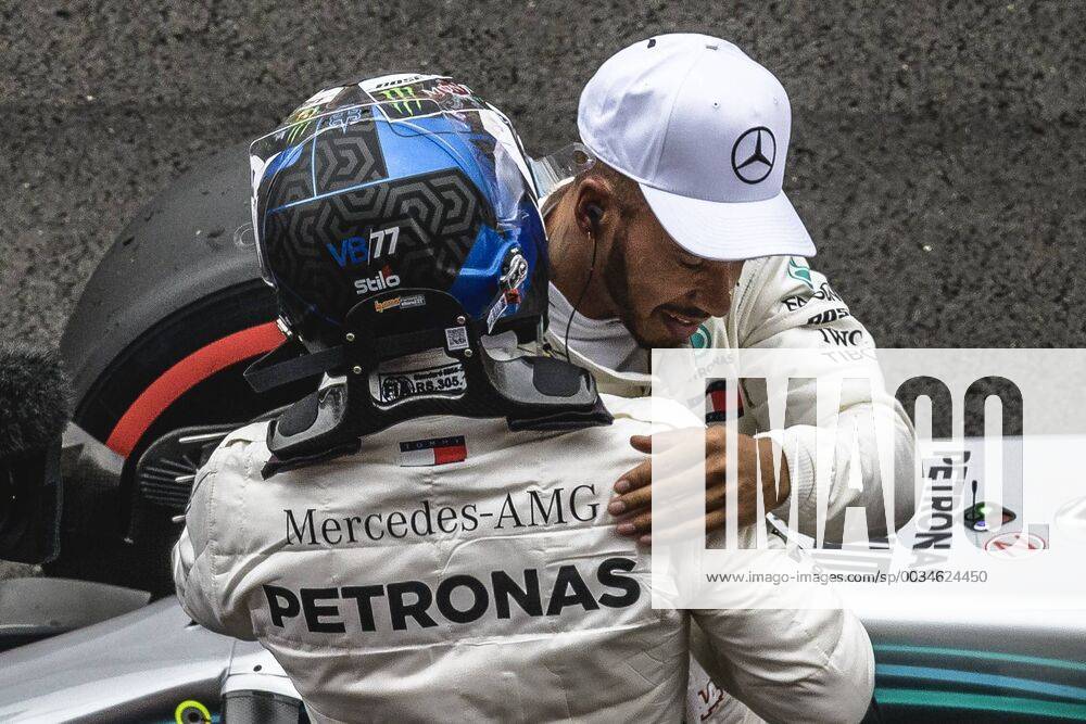 Barcelona, Catalonia, Spain - LEWIS HAMILTON (GBR) is congratulated by his teamate VALTTERI BOTTAS (FIN) after winning the Pole Position for the Spanish GP at Circuit de Barcelona - Catalunya F1 2018: Spanish Grand Prix: Hamilton Wins Pole - ZUMAo105 20180512_zap_o105_005