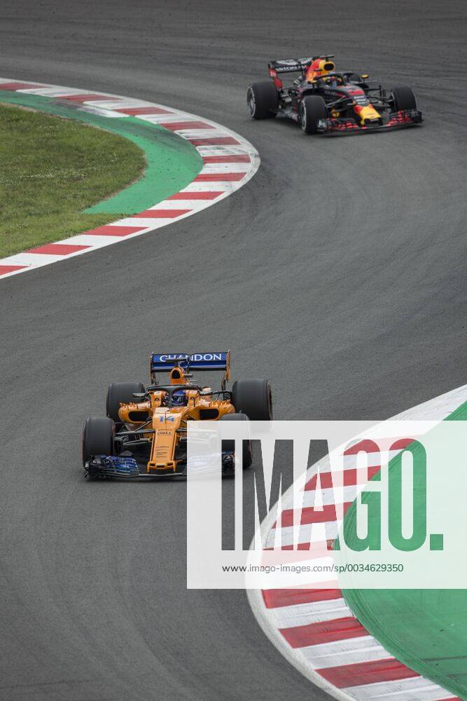 Montmelo, Spain - 14 Fernando Alonso from Spain with McLaren Renault MCL33 and 33 Max Verstappen Max from Netherlands Aston Martin Red Bull Tag Heuer RB14 during the Spanish Formula One Grand Prix at Circuit de Catalunya on March 12, 2018 in Montmelo, Spain. Spanish F1 Grand Prix - Qualifying - ZUMAn230 20180512_zaa_n230_638