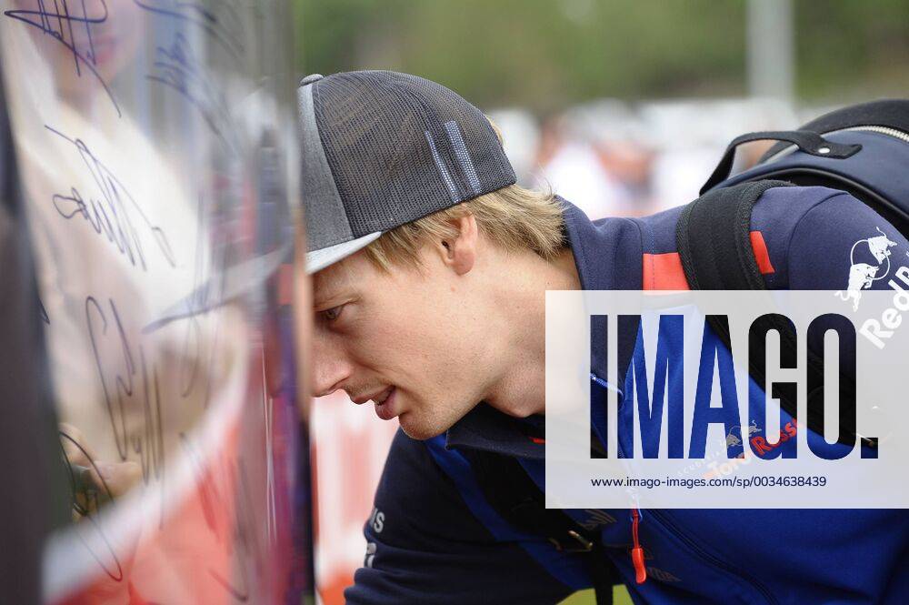 Brendon Hartley of New Zealand and Scuderia Toro Rosso signing an autograph during practice for the Spanish Formula One Grand Prix at Circuit de Catalunya on May 11, 2018 in Montmelo, Spain. Breton CordonxPressx xSpanishxF1xGrandxPrixx-xPracticex