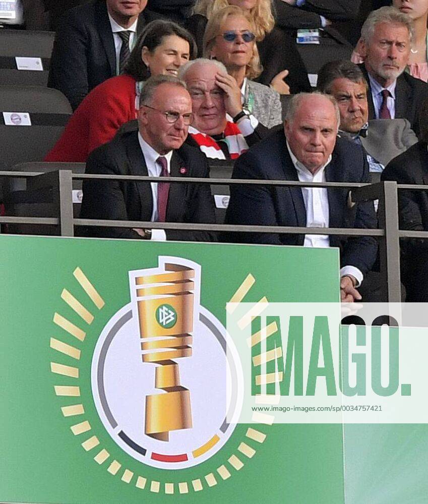 Football DFB Pokal Final 2018 FC Bayern Munich Eintracht Frankfurt in the Olympic Stadium in Berlin v li Chairman of the Board Karl Heinz Rummenigge FC Bayern Munich and President Uli Hoeness FC Bayern with a broken mine in the VIP box