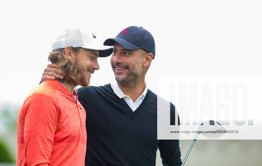 Pep Guardiola (Manchester City Manager) & Tommy Fleetwood (England) during the BMW PGA Golf Herren PRO-AM GOLF at Wentworth Drive, Virginia Water, England on 23 May 2018.