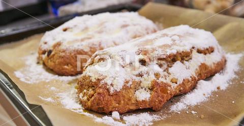 Traditional christmas baking sweet stollen at home, background, baked, baking paper, baking plate, biscuits, celebrate, celebration, christmas, christmas eve, closeup, cooking, decorative, delicious, dessert, eat, family, festive, fine pastry, food, fun, getting ready for christmas, healthy, holiday, home, homemade, ingredient, kitchen, making, mood, nutrition, nuts, pastry, pattern, reindeer, rustic, shape, shortcrust, snack, sweet, sweets, tasty, tradition, traditional, treat, white, xmas, yellow, yummy