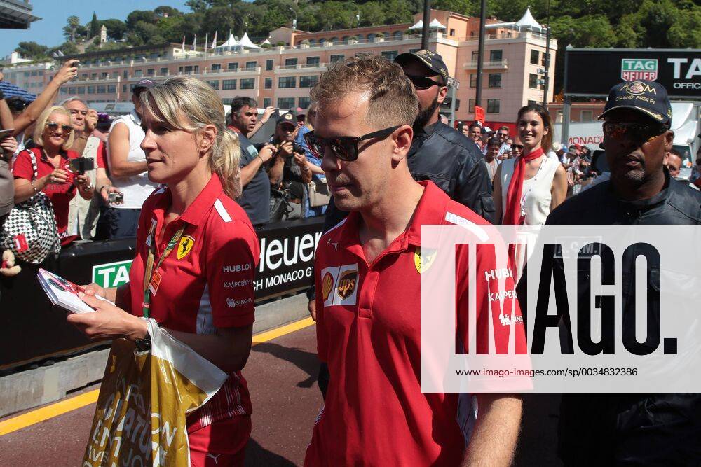 Photo4 LaPresse 25 03 2018 Monte Carlo, Monaco Grand Prix Formula One Monaco 2018 In the pic: Sebastian Vettel (GER) Scuderia Ferrari SF71H and Britta Roeske (AUT) Ferrari Press Officer.