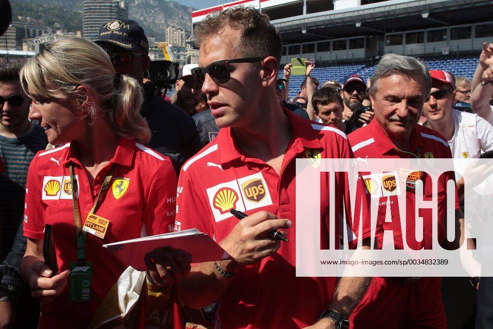 Photo4 LaPresse 25 03 2018 Monte Carlo, Monaco Grand Prix Formula One Monaco 2018 In the pic: Sebastian Vettel (GER) Scuderia Ferrari SF71H and Britta Roeske (AUT) Ferrari Press Officer.