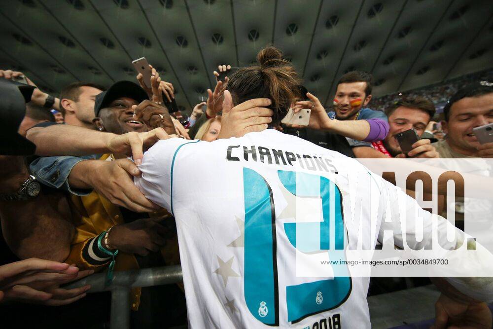 Real Madrid v Liverpool UEFA Champions League Final Gareth Bale of Real Madrid celebrates victory with the Real Madrid fans at the end of the UEFA Champions League Final at the Olympic Stadium, Kiev Content Not Available For UK Newspapers