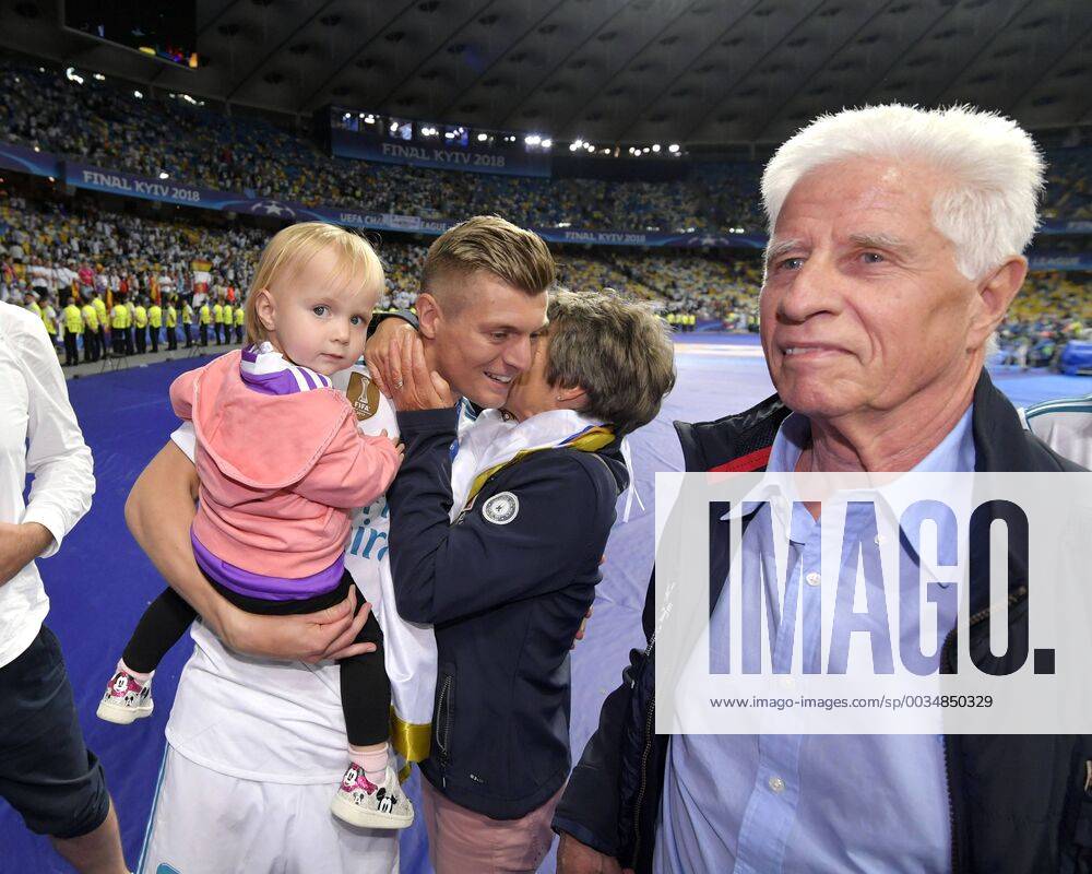Football UEFA Champions League Final 2018 Real Madrid FC Liverpool at the Olympic Stadium in Kiev Ukraine Champions League winner Toni Kroos Real Madrid has gathered his family around him after the match, watching the little girl curiously looking at the photographers, mother Kroos