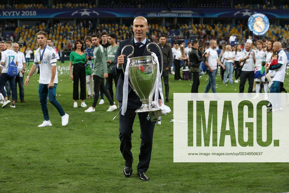 Real Madrid v Liverpool UEFA Champions League Final Real Madrid Manager Zinedine Zidane with the trophy at the end of the UEFA Champions League Final at the Olympic Stadium, Kiev Content Not Available For UK Newspapers