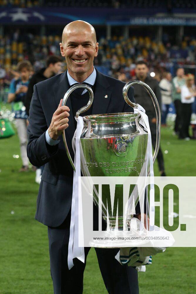 Real Madrid v Liverpool UEFA Champions League Final Real Madrid Manager Zinedine Zidane with the trophy at the end of the UEFA Champions League Final at the Olympic Stadium, Kiev Content Not Available For UK Newspapers