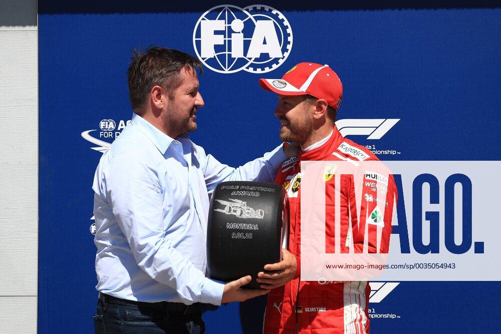 9th June 2018, Circuit Gilles-Villeneuve, Montreal, Canada; Canadian Formula One Grand Prix, qualification; Scuderia Ferrari, Sebastian Vettel takes pole and the pole trophy ActionPlus12035032 Octane