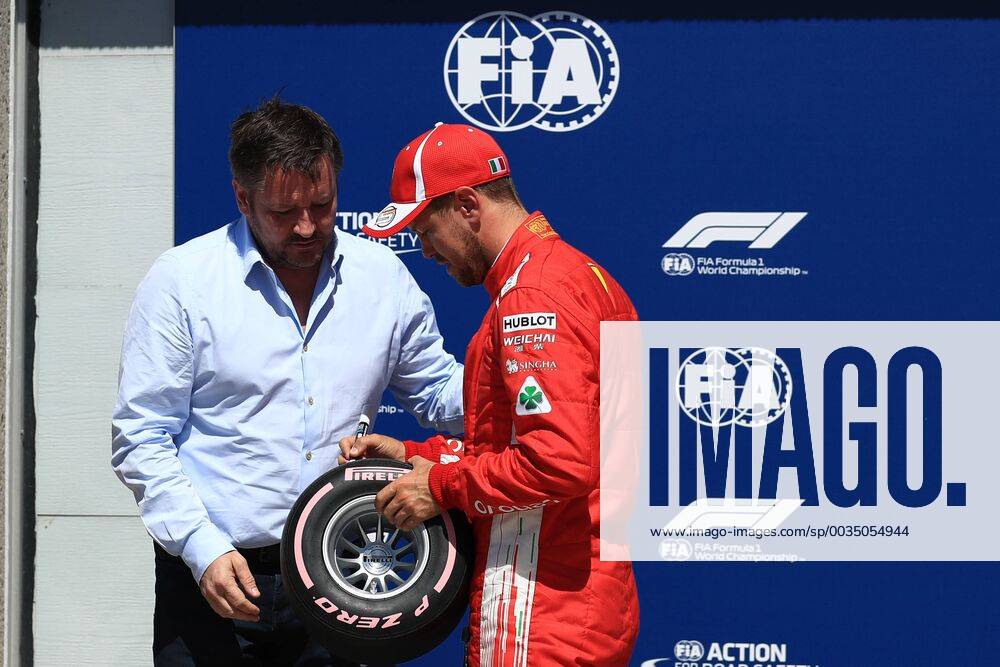 9th June 2018, Circuit Gilles-Villeneuve, Montreal, Canada; Canadian Formula One Grand Prix, qualification; Scuderia Ferrari, Sebastian Vettel takes pole and the pole trophy ActionPlus12035033 Octane