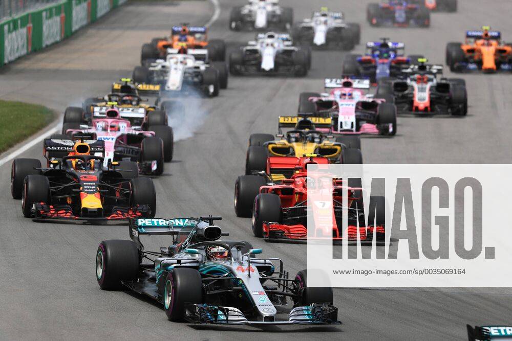 10th June 2018, Circuit Gilles-Villeneuve, Montreal, Canada; Canadian Formula One Grand Prix, race day; Scuderia Ferrari; Kimi Raikkonen runs behind Hamilton in 1st corner ActionPlus12035536 Octane