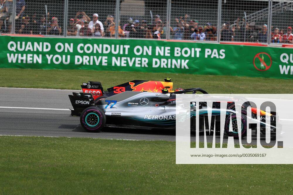 10th June 2018, Circuit Gilles-Villeneuve, Montreal, Canada; Canadian Formula One Grand Prix, race day; Mercedes AMG Petronas Motorsport; Valtteri Bottas and Aston Martin Red Bull Racing TAG Heuer Max Verstappen side by side in first 2 corners ActionPlus12035539 Octane