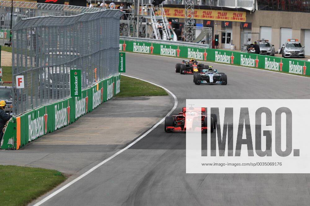 10th June 2018, Circuit Gilles-Villeneuve, Montreal, Canada; Canadian Formula One Grand Prix, race day; Scuderia Ferrari, Sebastian Vettel leads as the safety car pulls off ActionPlus12035548 Octane