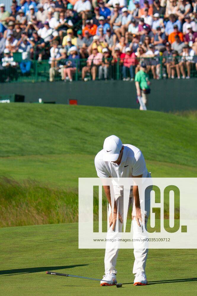 Rory McIlroy from Northern Ireland reacts to missing a putt on the 11th green in the first round of the 118th U.S. Open Championship at Shinnecock Hills Golf Club in Southampton, New York on June 14, 2018. NYP20180614124 COREYxSIPKIN
