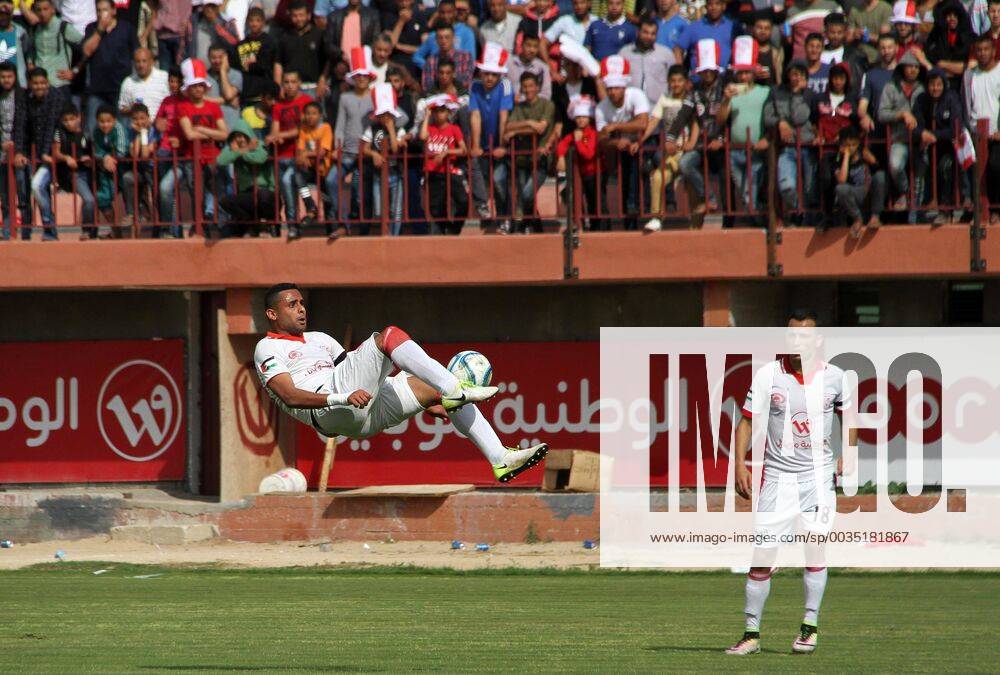 Gaza City, Gaza Strip, Palestinian Territory - Palestinian players of Shabab Khan Younis football club (white) compete with Palestinian players of Shabab Rafah football club (blue) during the final football match of the Palestine Cup for the southern governorates at Palestine stadium in Gaza city on April 30, 2018 Middle East News - April 30, 2018 - ZUMAap3_ 83020171st