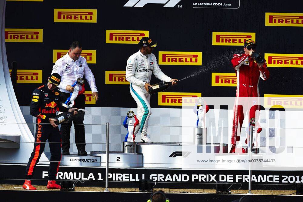 24th June 2018, Circuit Paul Ricard, Le Castellet, France; French Formula One Grand Prix, race day; (L-R) Max Verstappen of the Red Bull Racing Team 3rd place , Lewis Hamilton of the Mercedes AMG F1 Team 1st place and Kimi Raikkonen of the Ferrari Team 3rd place celebrate on the podium after the race ActionPlus12040318 PabloxGuillen