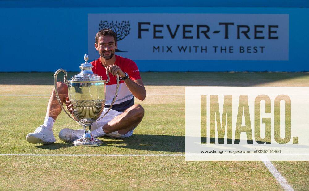 - SPORT Marin ?aili? of Croatia poses with the winning trophy during the Fever Tree Championships FINAL (The Queens Club 2018) match between DJOKOVIC and CILIC at The Queen s Club, London, England on 24 June 2018.