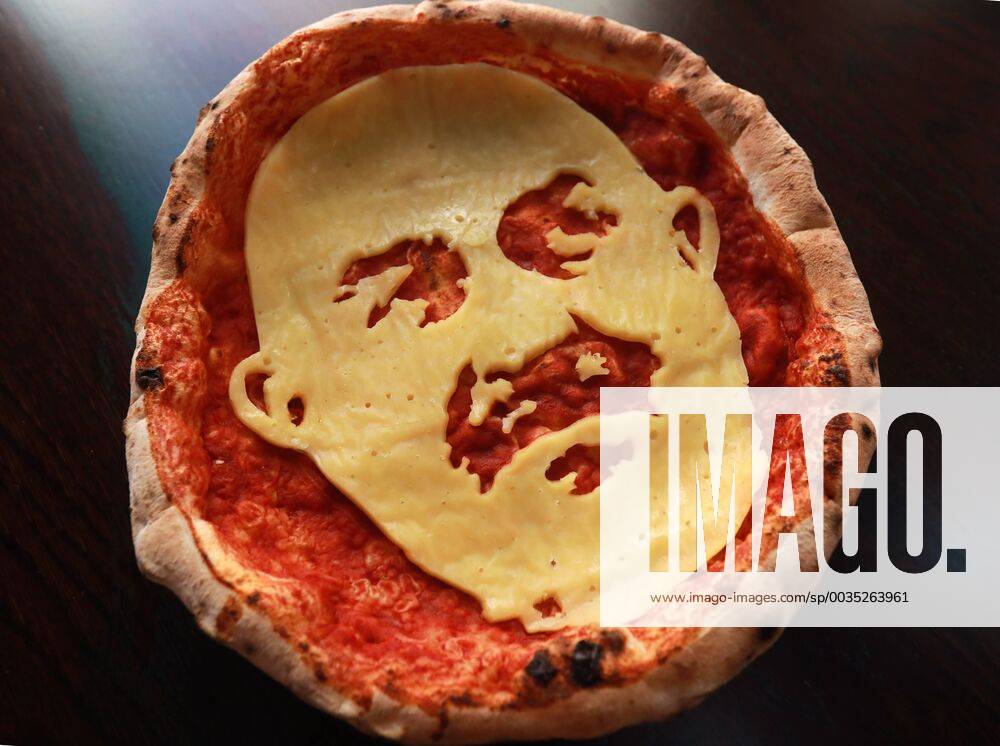 SPORT ST PETERSBURG, RUSSIA â€“ JUNE 25, 2018: Cheese pizza bearing the likeness of head coach Stanislav Cherchesov of the Russian men s national football team, at the Hophead Tap Room bar. Sergei Konkov TASS 84001644st