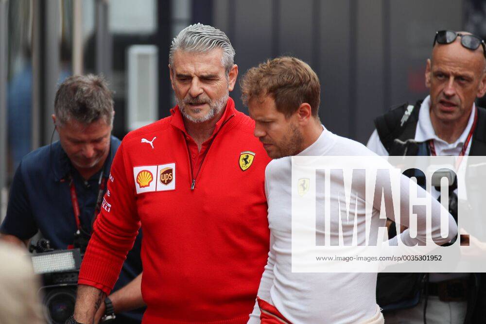 FORMULA 1 - GP of Austria 2018 SPIELBERG,AUSTRIA,29.JUN.18 - MOTORSPORTS, FORMULA 1 - Grand Prix of Austria, Red Bull Ring, free practice. Image shows team principal Maurizio Arrivabene (Ferrari) and Sebastian Vettel (GER Ferrari). GEPAxpictures xChristianxWalgram