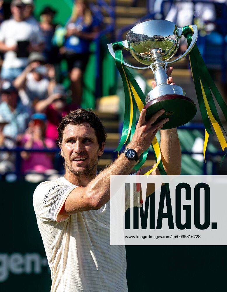 Mischa Zverev celebrates with the Winners Trophy during the Nature Valley Eastbourne International Men s Single Final between Lukas Lacko (Slovakia) and Mischa Zverev (Germany) at Devonshire Park Lawn Tennis Club, Eastbourne, England on 30th June 2018.