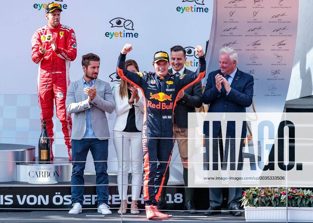 Red Bull Ring Spielberg AUT FIA Formula 1 Grand Prix of Austria Races in the picture Sebastian Vettel GER Scuderia Ferrari Marcel Hirscher AUT Winner Max Verstappen NED Red Bull Racing German Formula One driver Sebastian Vettel of Scuderia Ferrari Marcel Hirscher AUT Racewinner Dutch Formula One driver Max Verstappen of Red Bull Racing at the Austrian FIA Formula One Grand Prix at the Red Bull Ring at Spielberg France on 2018 07 01 Spielberg EX_FEI
