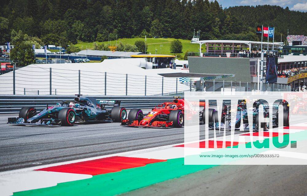 Red Bull Ring Spielberg AUT FIA Formula 1 Grand Prix of Austria race in picture Start Lewis Hamilton GBR Mercedes Kimi Raeikkoenen FIN Scuderia Ferrari Finnish Formula One driver Valtteri Bottas of Mercedes British Formula One driver Lewis Hamilton of Mercedes Finnish Formula One driver Kimi Raeikkoenen of Scuderia Ferrari Formula One driver Valtteri Bottas of Mercedes during the Austrian Formula One Grand Prix at the Red Bull Ring in Spielberg France on 2018 07 01 Spielberg EX_FEI