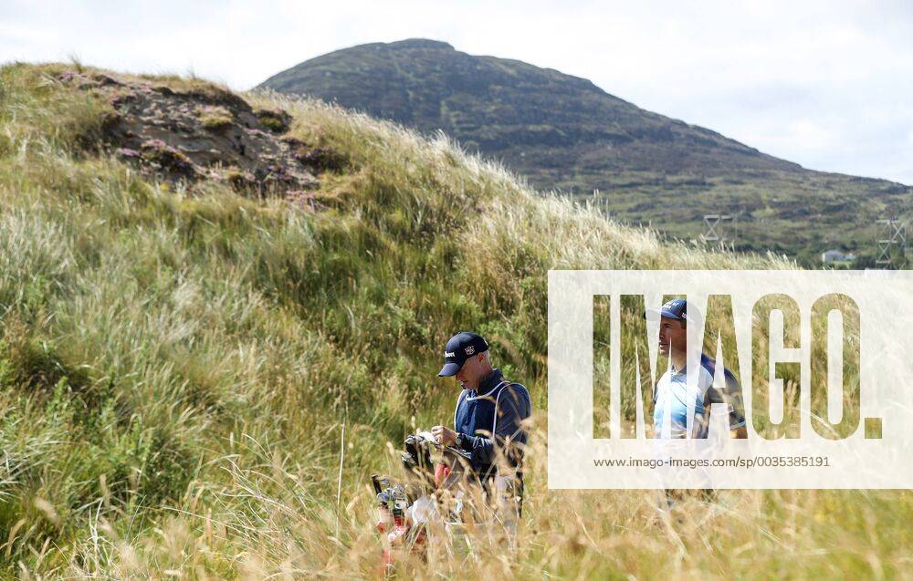 2018 Dubai Duty Free Irish Open - Day 1, Ballyliffin Golf Club, Co. Donegal 5 7 2018 Padraig Harringron with caddy Ronan Flood on the 18th hole Padraig Harringron with caddy Ronan Flood 5 7 2018