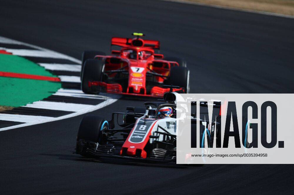 Romain Grosjean Haas F1 Team and Kimi Raikkoenen Scuderia Ferrari AUT FIA Formula 1 Grand Prix of Great Britain Silverstone
